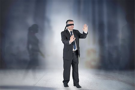 simsearch:400-07665425,k - Composite image of mature businessman in a blindfold against grey room Stockbilder - Microstock & Abonnement, Bildnummer: 400-07664074