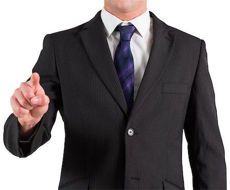 simsearch:400-07664375,k - Businessman in suit standing and pointing on white background Foto de stock - Royalty-Free Super Valor e Assinatura, Número: 400-07664374