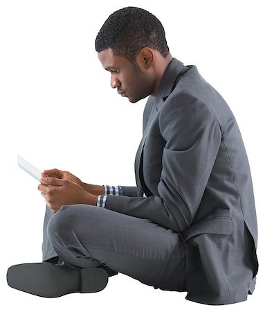 simsearch:400-07665425,k - Businessman sitting and holding tablet on white background Stockbilder - Microstock & Abonnement, Bildnummer: 400-07664549