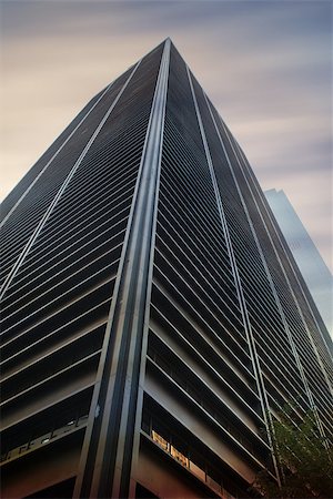 simsearch:400-07525974,k - Low angle view of skyscraper under dark sky Stock Photo - Budget Royalty-Free & Subscription, Code: 400-07664734