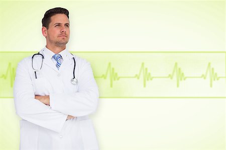 ecg electrodes - Handsome doctor with arms crossed against medical background with green ecg line Stock Photo - Budget Royalty-Free & Subscription, Code: 400-07665096