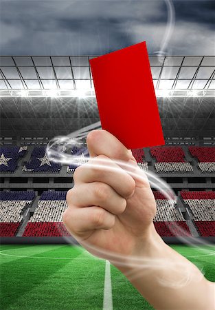 simsearch:400-07665266,k - Hand holding up red card against stadium full of usa football fans Stock Photo - Budget Royalty-Free & Subscription, Code: 400-07665252