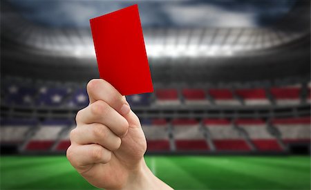 simsearch:400-07665266,k - Hand holding up red card against stadium full of usa football fans Stock Photo - Budget Royalty-Free & Subscription, Code: 400-07665277