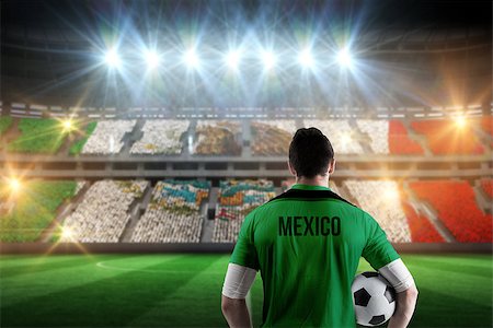 simsearch:400-07665266,k - Mexico football player holding ball against stadium full of mexico football fans Stock Photo - Budget Royalty-Free & Subscription, Code: 400-07665360