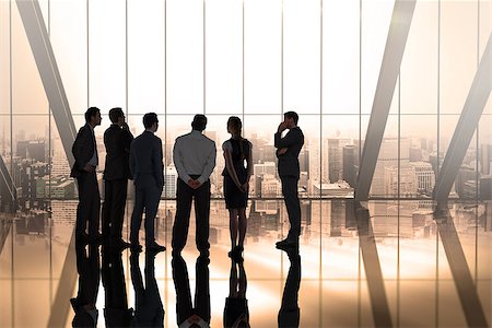 simsearch:400-07665756,k - Composite image of business colleagues talking in large room overlooking city Stock Photo - Budget Royalty-Free & Subscription, Code: 400-07665768