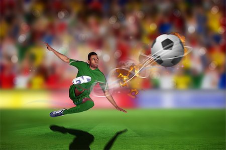 simsearch:400-07665266,k - Football player in green kicking against blurry football pitch with crowd Stock Photo - Budget Royalty-Free & Subscription, Code: 400-07666158