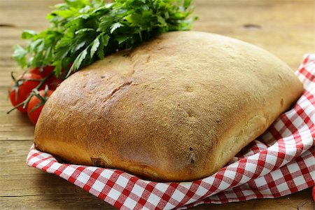 traditional Italian ciabatta bread with tomatoes and herbs Stock Photo - Budget Royalty-Free & Subscription, Code: 400-07666179
