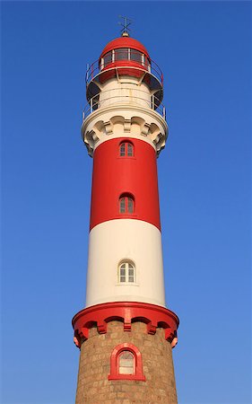 Famous Lighthouse in Swakopmund, a germam style colonial city on the Atlantic coast of northwestern Namibia Foto de stock - Super Valor sin royalties y Suscripción, Código: 400-07666514