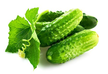 simsearch:400-07667021,k - Fresh cucumber in wooden box with green leaf and flower. Isolated on white background Stock Photo - Budget Royalty-Free & Subscription, Code: 400-07667046