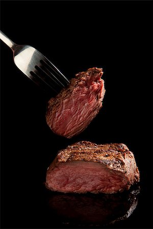 medium rare beef steak on black background. Stock Photo - Budget Royalty-Free & Subscription, Code: 400-07667143