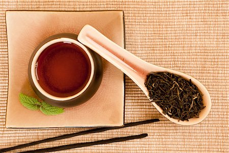 simsearch:400-05153477,k - Black tea still life with insence sticks and mint leave. Photographie de stock - Aubaine LD & Abonnement, Code: 400-07667150