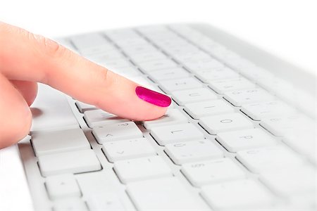 Female finger with red fingernail touching silver and white keyboard, selective focus. Help desk concept. Stock Photo - Budget Royalty-Free & Subscription, Code: 400-07667152