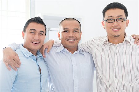 Southeast Asian business team in office. Stock Photo - Budget Royalty-Free & Subscription, Code: 400-07667599