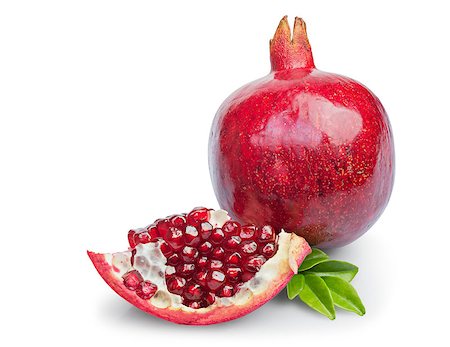 simsearch:400-06457388,k - Juicy pomegranate fruit with leaves isolated on a white background Photographie de stock - Aubaine LD & Abonnement, Code: 400-07667691