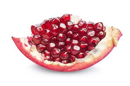 simsearch:400-06457388,k - Juicy slice pomegranate fruit  isolated on a white background Photographie de stock - Aubaine LD & Abonnement, Code: 400-07667693