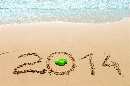 digits   2014 on the sand seashore - concept of new year and passing of time Stock Photo - Budget Royalty-Free & Subscription, Code: 400-07667703