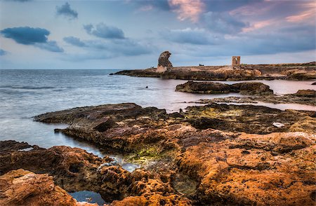 rocky beach with ancient ruins in the  morgning Stock Photo - Budget Royalty-Free & Subscription, Code: 400-07668935
