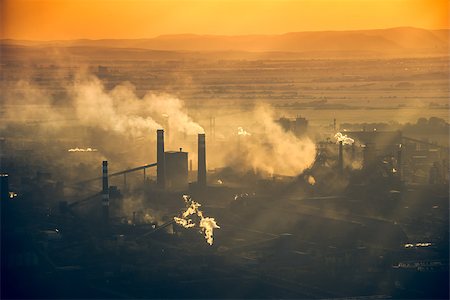 smoke chimney - An outline of a factory against sunset Stock Photo - Budget Royalty-Free & Subscription, Code: 400-07668937