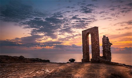 Sunset over the Sea and Rocky Coast with Ancient Ruins and Gate to Africa in Mahdia, Tunisia Stock Photo - Budget Royalty-Free & Subscription, Code: 400-07668948