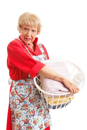 simsearch:640-03260502,k - Senior woman hates doing laundry.  Isolated on white. Stock Photo - Budget Royalty-Free & Subscription, Code: 400-07669044