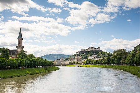 starmaro (artist) - Salzburg,Austria-May 11,2014:Panoramic view of the historic city of Salzburg with Fortress Hohensalzburg in the background in Salzburg, Austria during a sunny day Stock Photo - Budget Royalty-Free & Subscription, Code: 400-07669641