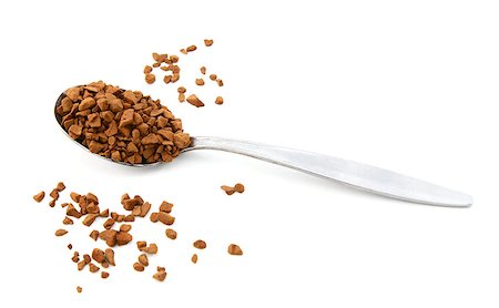 Teaspoon of instant coffee with some granules spilled around the spoon, isolated on a white background Stock Photo - Budget Royalty-Free & Subscription, Code: 400-07669838