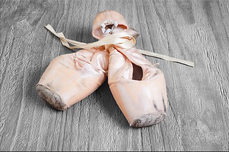 simsearch:400-07660010,k - Old used  ballet pointe shoes on vintage wooden background Stock Photo - Budget Royalty-Free & Subscription, Code: 400-07660008