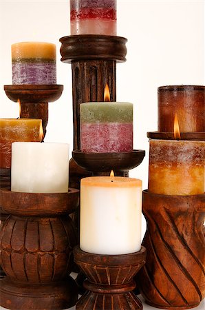 simsearch:693-06018760,k - Assortment of decorative scented candles shot on a white background. Photographie de stock - Aubaine LD & Abonnement, Code: 400-07660541
