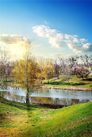 Beautiful river and blue sky in early spring Stock Photo - Budget Royalty-Free & Subscription, Code: 400-07661124