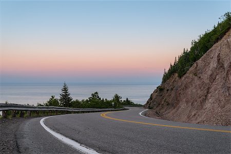 Cabot Trail Highway at dusk (Cape Breton, Nova Scotia, Canada) Foto de stock - Royalty-Free Super Valor e Assinatura, Número: 400-07661137