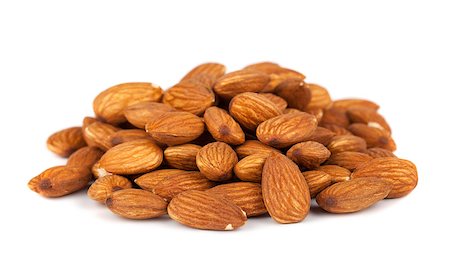 simsearch:400-08695656,k - Heap of almond nuts isolated on white background Foto de stock - Super Valor sin royalties y Suscripción, Código: 400-07661404