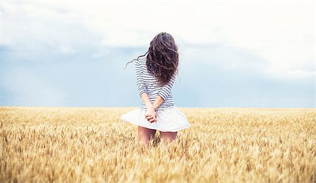 picture of people dancing for harvest - The beautiful girl is on a wheaten field Stock Photo - Budget Royalty-Free & Subscription, Code: 400-07661654