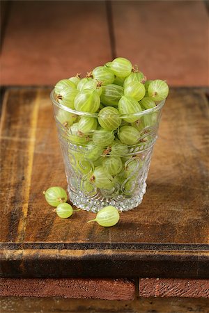 ribes grossularia - fresh ripe green gooseberries on wooden table Stock Photo - Budget Royalty-Free & Subscription, Code: 400-07662141