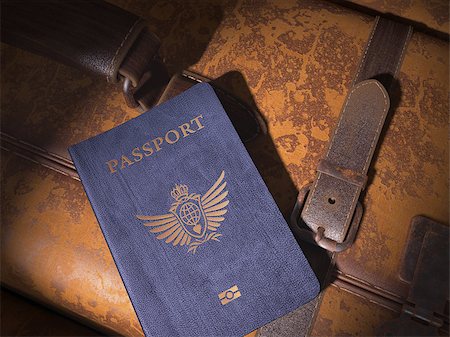 simsearch:400-05333347,k - A Generic Passport on an old suitcase. An international voyage. Stock Photo - Budget Royalty-Free & Subscription, Code: 400-07662228