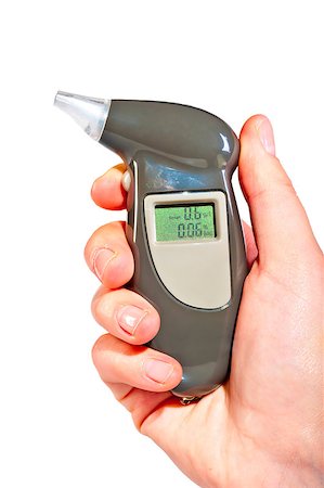 drunk driving - Breathalyzer in a female hand showing drunkenness Stock Photo - Budget Royalty-Free & Subscription, Code: 400-07662288