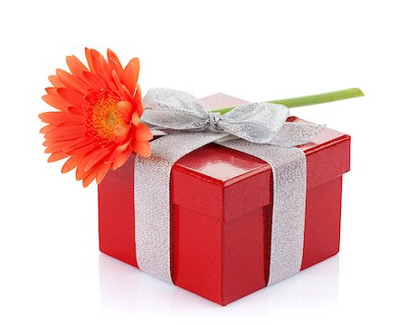 simsearch:400-08298802,k - Orange gerbera flower over gift box. Isolated on white background Photographie de stock - Aubaine LD & Abonnement, Code: 400-07662617