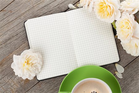 Blank notepad, coffee cup and white rose flowers on wooden table background Stock Photo - Budget Royalty-Free & Subscription, Code: 400-07662634