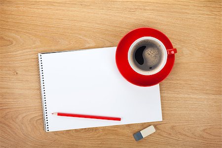 simsearch:400-07481880,k - Blank notepad with office supplies and red coffee cup on wooden table. Above view Fotografie stock - Microstock e Abbonamento, Codice: 400-07662676