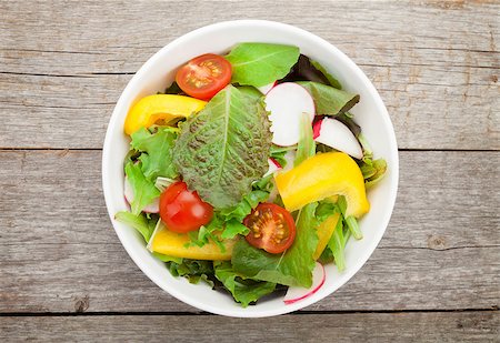simsearch:400-06485512,k - Fresh healthy salad on wooden table. View from above Stock Photo - Budget Royalty-Free & Subscription, Code: 400-07662749