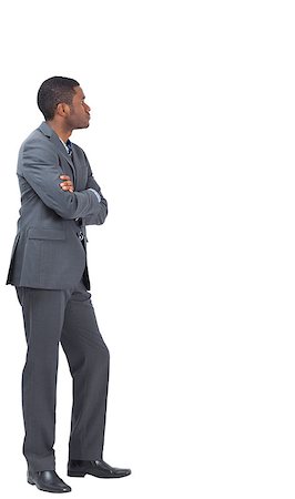 simsearch:400-07665425,k - Serious businessman standing with his arms folded on white background Stockbilder - Microstock & Abonnement, Bildnummer: 400-07663461