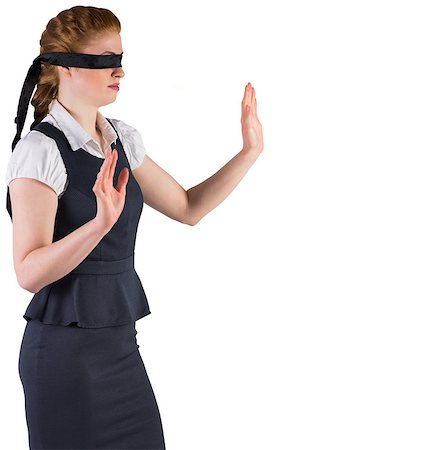 simsearch:400-08264445,k - Redhead businesswoman in a blindfold on white background Stock Photo - Budget Royalty-Free & Subscription, Code: 400-07663484