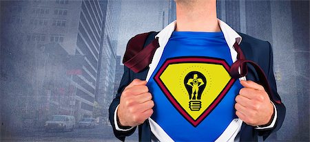 simsearch:400-07664375,k - Businessman opening shirt in superhero style against urban projection Foto de stock - Royalty-Free Super Valor e Assinatura, Número: 400-07663923