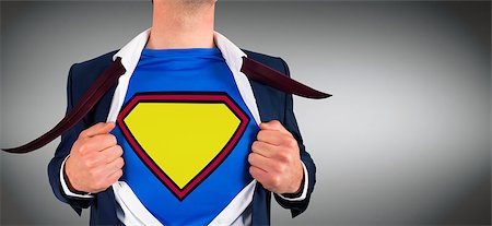 simsearch:400-07664375,k - Businessman opening shirt in superhero style against grey vignette Foto de stock - Royalty-Free Super Valor e Assinatura, Número: 400-07663970