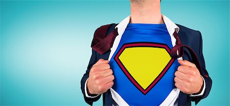 person opening shirt - Businessman opening shirt in superhero style against blue vignette Stock Photo - Budget Royalty-Free & Subscription, Code: 400-07663971