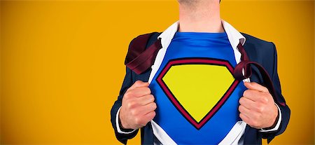 simsearch:400-07664375,k - Businessman opening shirt in superhero style against yellow background with vignette Foto de stock - Royalty-Free Super Valor e Assinatura, Número: 400-07663973