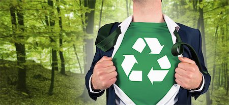 Businessman opening shirt in superhero style against peaceful green forest Stock Photo - Budget Royalty-Free & Subscription, Code: 400-07663985
