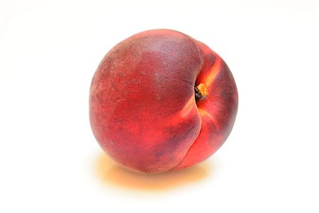 detail of one peach on white background. Fresh fruit. Photographie de stock - Aubaine LD & Abonnement, Code: 400-07675152
