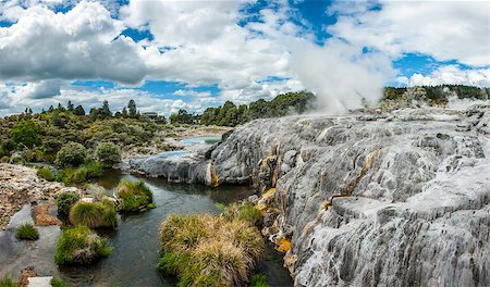 White travertine terraces and Pohutu with Prince of Wales geysers in Rotorua area, New Zealand. Panoramic photo Photographie de stock - Aubaine LD & Abonnement, Code: 400-07675196