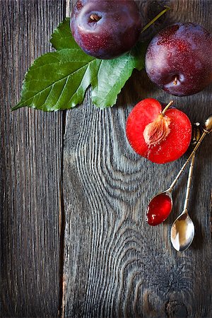 Fresh ripe plums and delicious homemade jam on an old wooden board with place for recipe text. Stock Photo - Budget Royalty-Free & Subscription, Code: 400-07675907