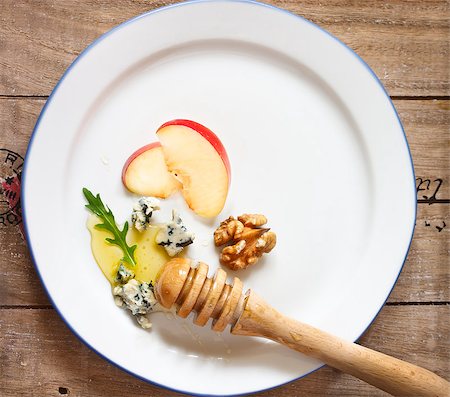simsearch:400-05682309,k - Snack of blue cheese with honey, apple fruit and nuts on plate. Rustic style. Stock Photo - Budget Royalty-Free & Subscription, Code: 400-07675953
